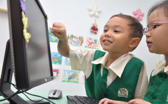 Literacy Through I.T ( LIT) programme, conducted in the computer lab, help children to learn to read before they write.
